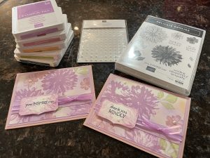 Custom made cards with corresponding Stampin' Up! inks and die cuts surround it